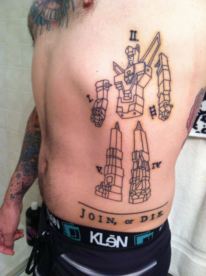 Creative transformers side tattoo