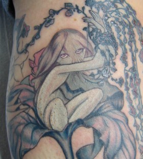 Creepy girl in a flower tattoo