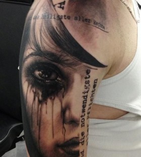 Crying girl tattoo by Florian Karg