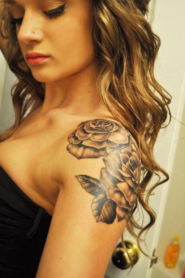 Curly hair shoulder tattoo