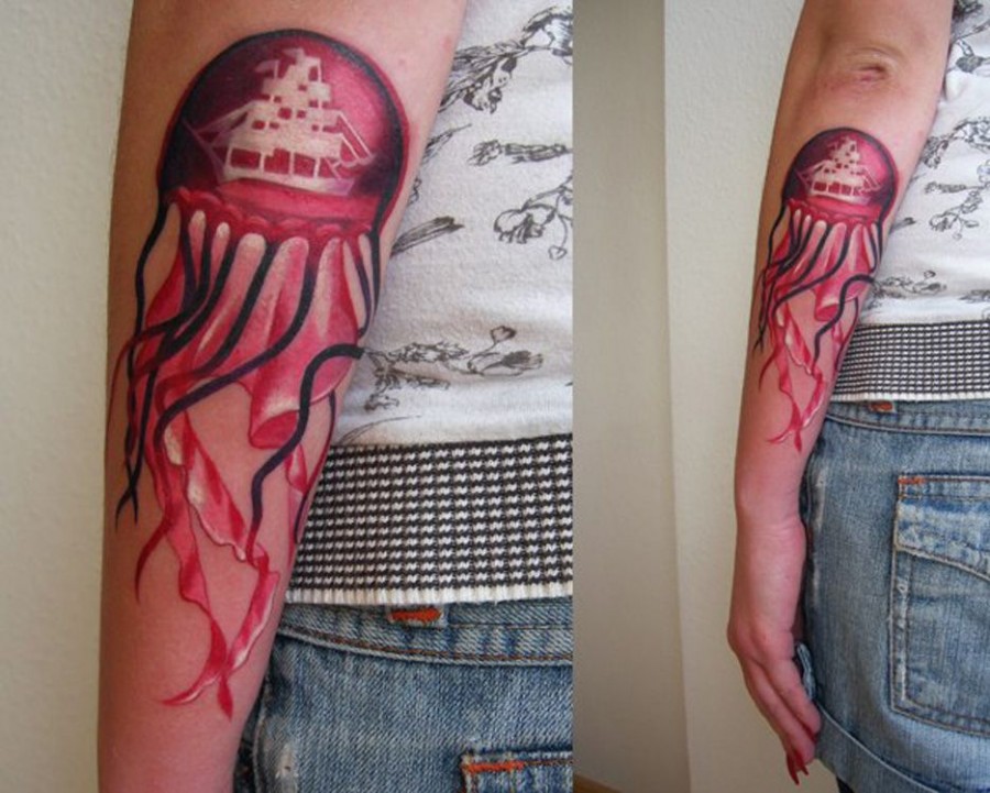 Custom jellyfish arm tattoo