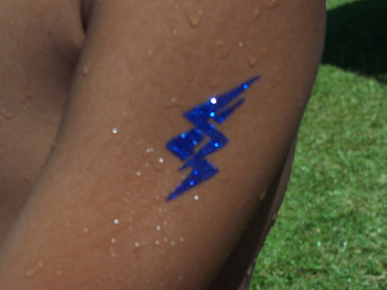 Cute blue lightning tattoo