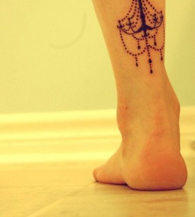 Cute chandelier leg tattoo