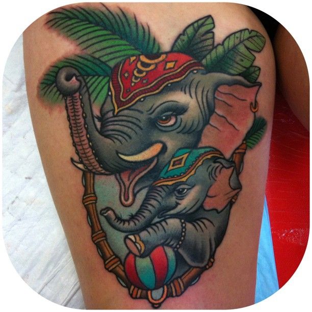 Cute elephants tattoo by W. T. Norbert