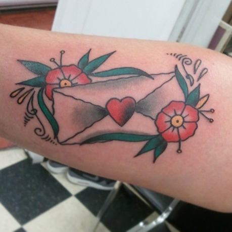 Cute envelope and flowers tattoo