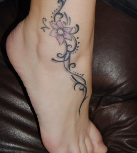 Cute flower tattoo on ankle