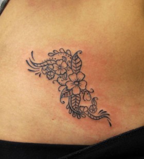 Cute flowers stomach tattoo