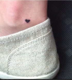 Cutest black heart tiny tattoo