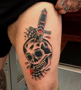Dagger through skull tattoo by Nick Oaks