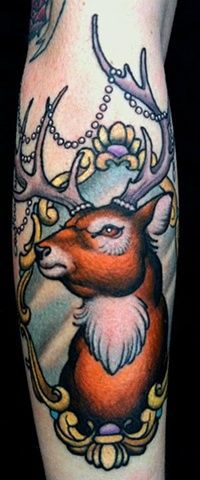 Deer frame tattoo by W. T. Norbert