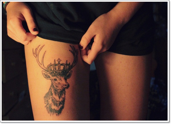 Deer with a crown tattoo