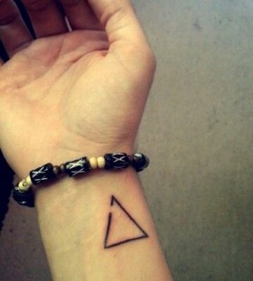 Delta black triangle tattoo