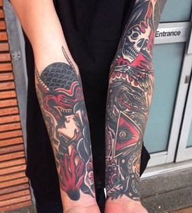 Devil and a woman arm tattoo by James McKenna