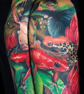 Different frogs arm tattoo