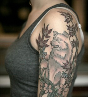 Dog and flowers tattoo by Kirsten Holliday