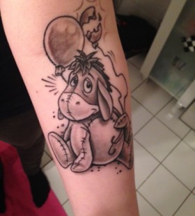 Donkey with a balloon tattoo