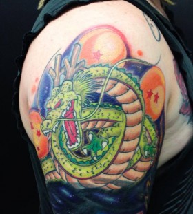 Dragon ball theme arm tattoo