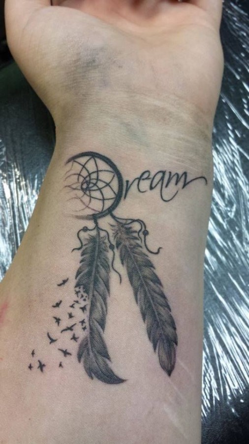 Dream catcher black wrist tattoo