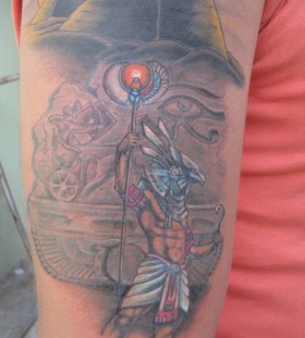 Egyptian god anubis arm tattoo