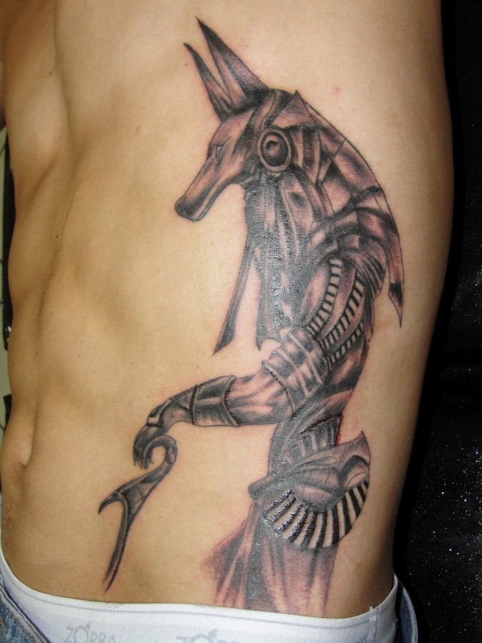 Egyptian god anubis side tattoo