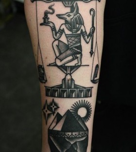 Egyptian god anubis tattoo by Philip Yarnell