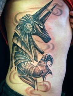 Egyptian god side tattoo