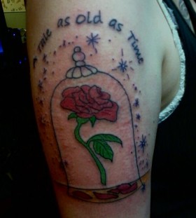 Enchanted rose and quote tattoo