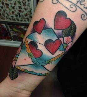 Envelope and hearts tattoo