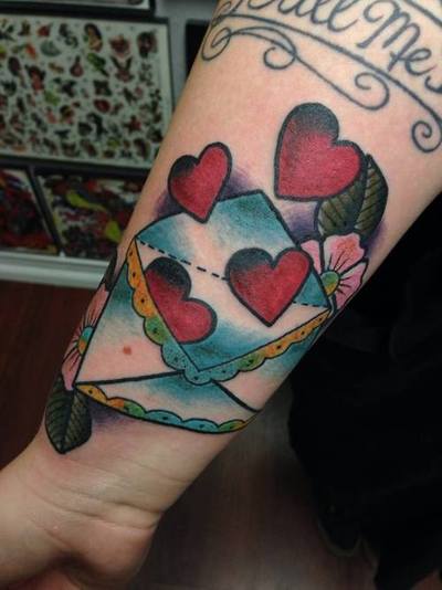 Envelope and hearts tattoo