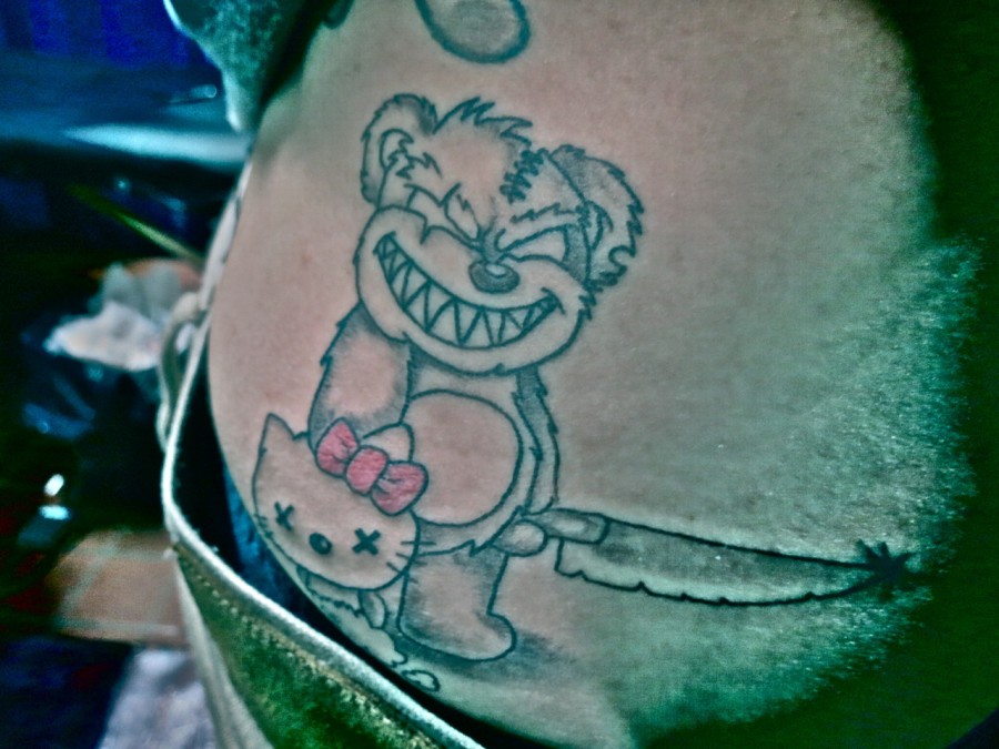 Evil teddy bear tattoo