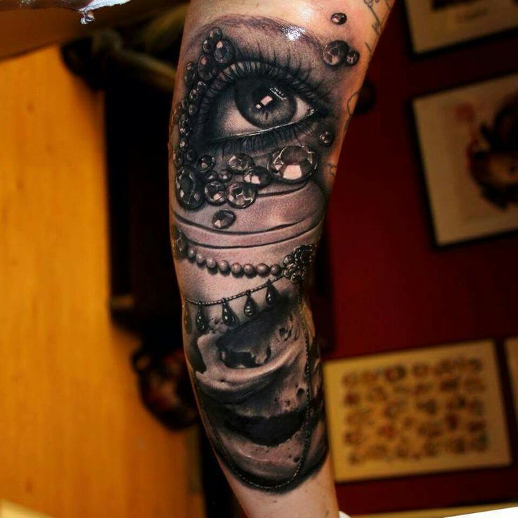 Eye and jewels tattoo by Riccardo Cassese