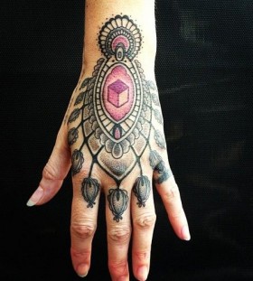 Fantastic hand tattoo by Gerhard Wiesbeck