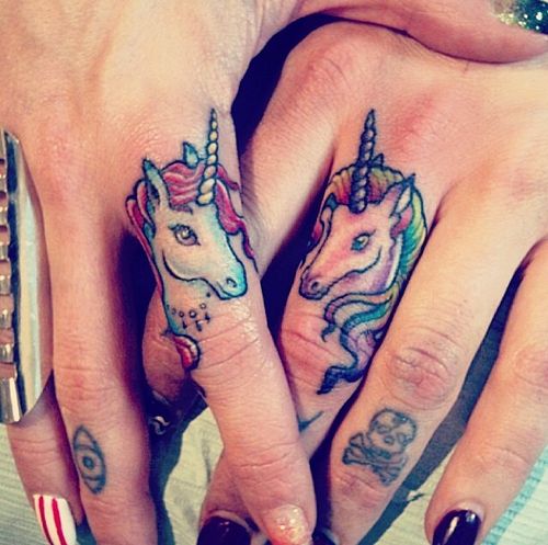 Fingers lovely unicorn tattoo