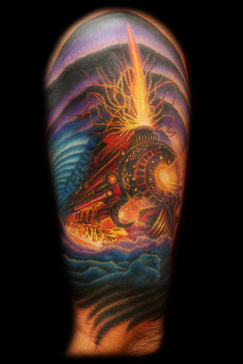 Flaming train arm tattoo