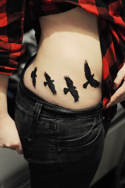 Flock of ravens tattoo