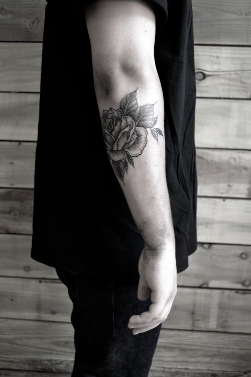 Flower arm tattoo by Thomas Cardiff