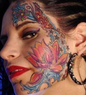 Flower face tattoo