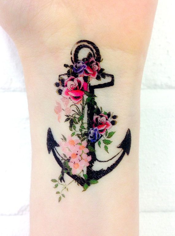 Flowers and anchor wrist tattoo