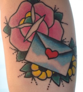 Flowers and envelope tattoo