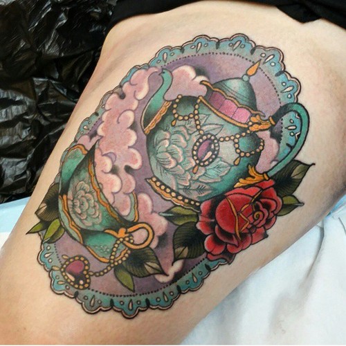 Framed teapot and rose tattoo