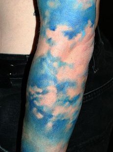 Full arm sky tattoo by David Allen