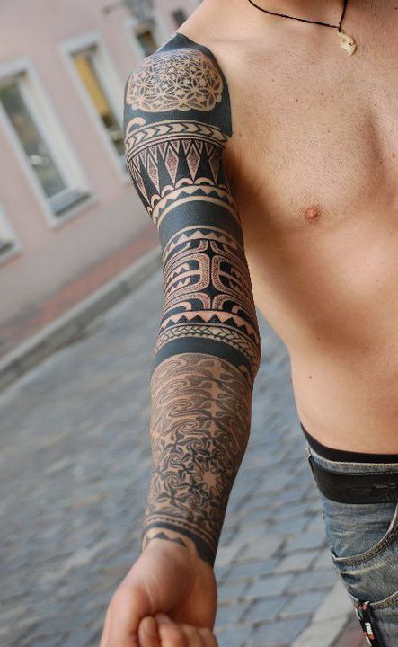 Full arm tattoo by Gerhard Wiesbeck