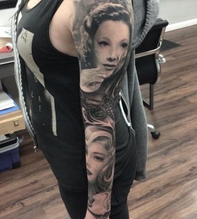 Full arm tattoo by Kyle Cotterman