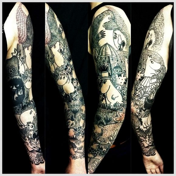 Full arm tattoo by Matt Cooley