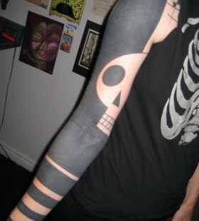 Full arm tattoo by Yann Black