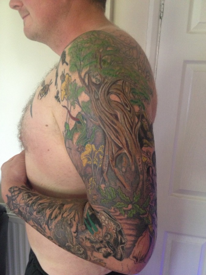 Full arm tree tattoo
