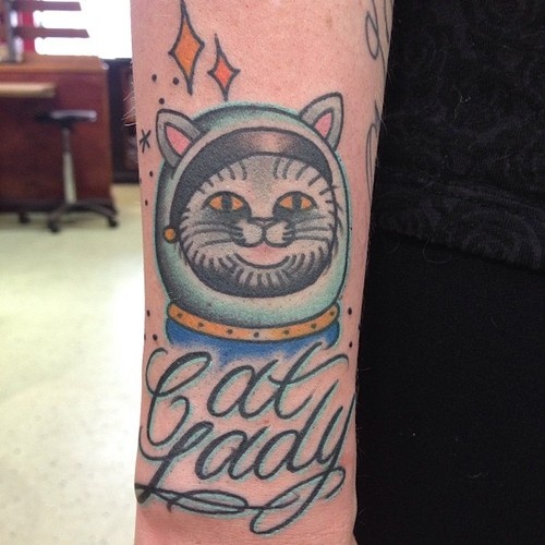 Funny cat tattoo by Clare Hampshire