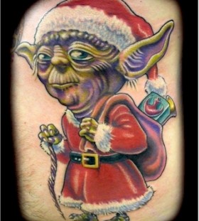 Funny looking grinch christmas tattoo