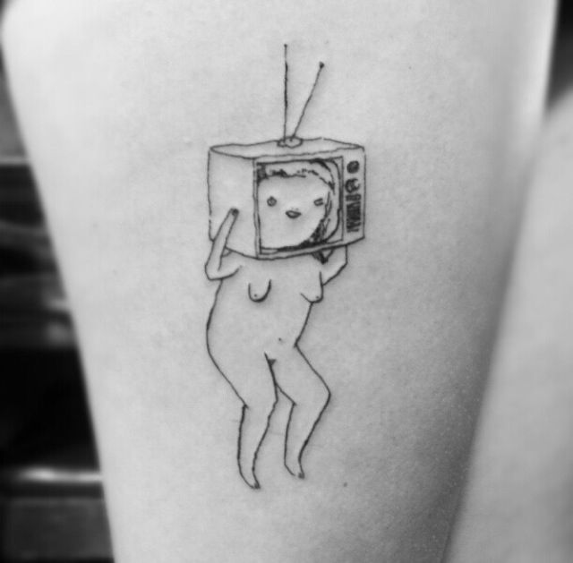Funny woman with tv tattoo