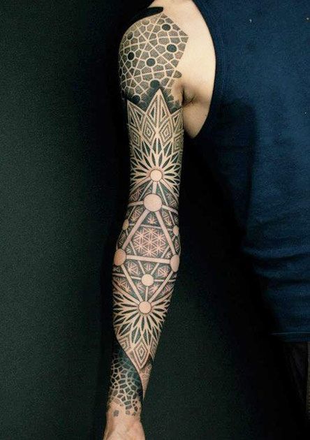 Geometric full arm tattoo by Gerhard Wiesbeck